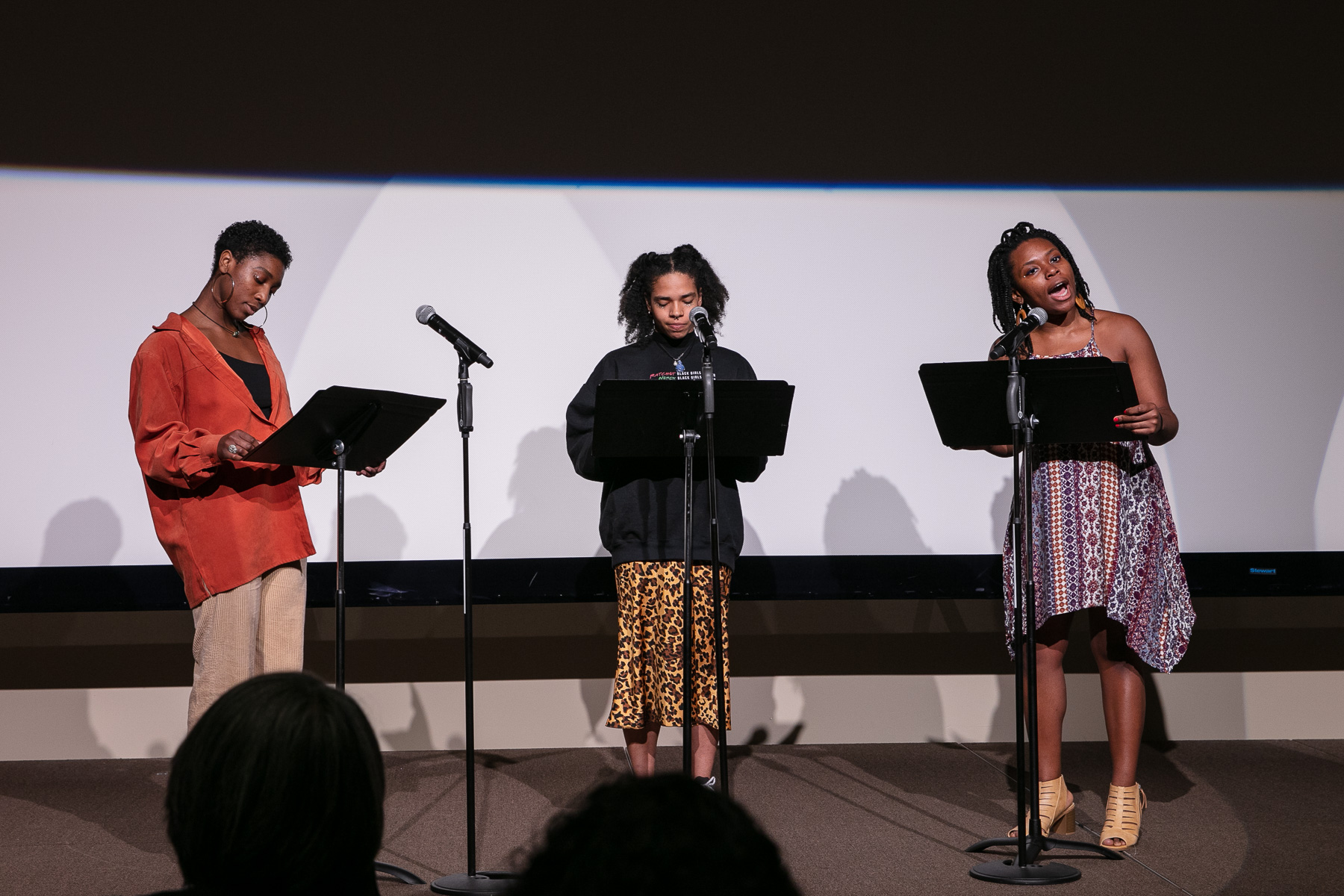 Students from The Theatre School performed a spoken word piece reflecting on Black History Month. From left to right, Jasmine Rush, Gabriella Mendoza and Kidjie Boyer. (DePaul University/Randall Spriggs)